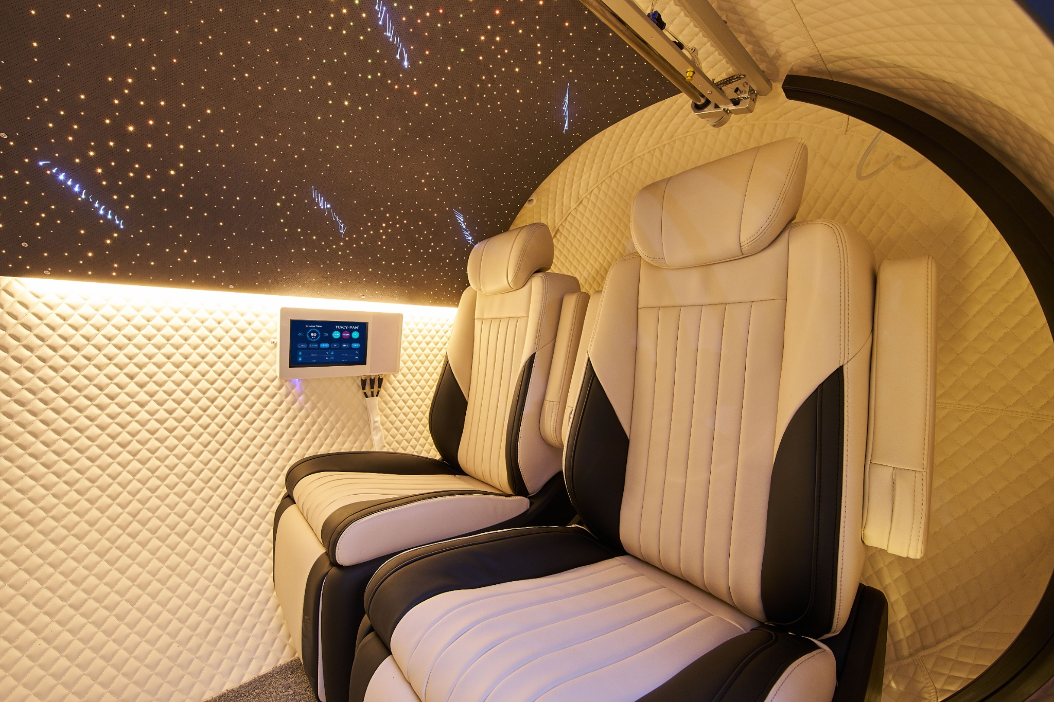GenZen two-seat layout with cream leather seating